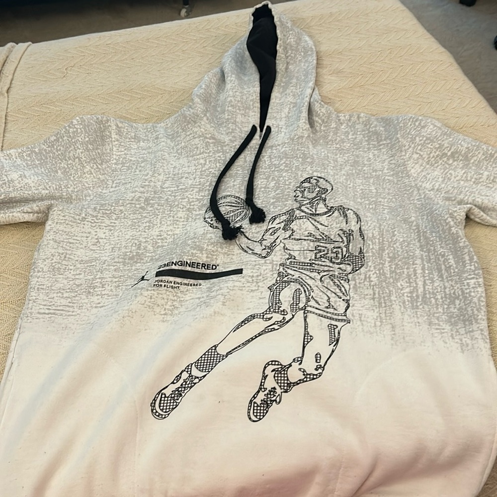 White Hoodie with Michael Jordan on front.